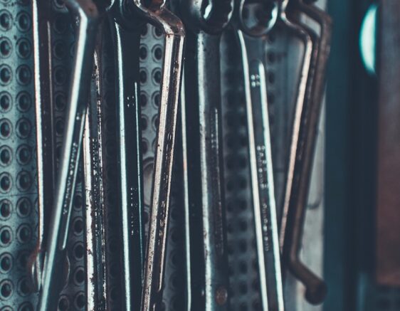 close-up photo of gray combination wrench set